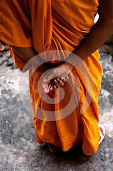 Monk at Angkor Wat ruins, Cambodia