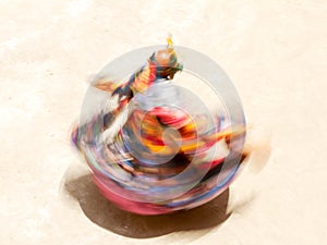 Monk in a bull deity mask performs a sacred dance of Tantric Tibetan Buddhism in Lamayuru monastery. Blurred motion technique