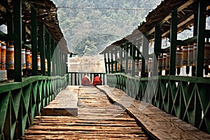 Monk doing prayer at Khechupalri Lake