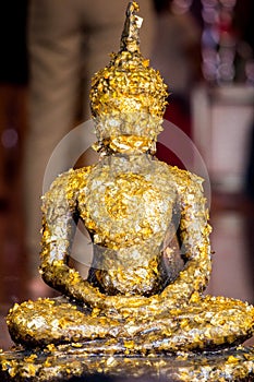 Monk golden image of Buddha