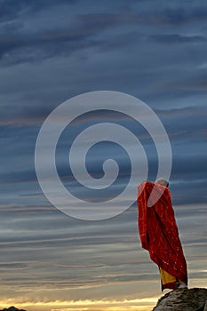 The monk in praying to sky.