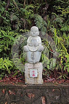 A monk sculpture on Guanyin Mountain, Guangdong Province, China