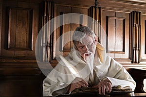 Monk writing with quill