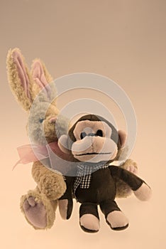 Monkey doll with rabbit background vintage.
