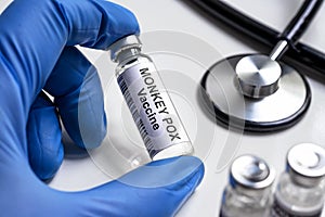 Monkey pox vaccine in doctors hand photo