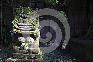 Monkey spirit sculpture in Arma Museum on the left, Ubud, Bali, Indonesia photo