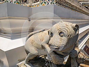 Monkey statue in Wat Arun, locally known as Wat Chaeng, is a landmark temple on the west Thonburi bank of the Chao Phraya river