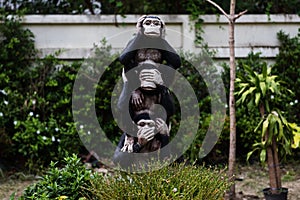monkey statues with hand sign