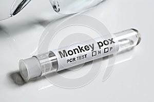 Monkeypox PCR test tube close-up. Equipment for monkey pox virus diagnostics photo