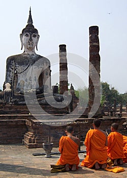 Monks praying photo