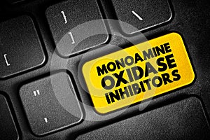 Monoamine Oxidase Inhibitors - class of drugs that inhibit the activity of one or both monoamine oxidase enzymes, text button on