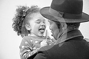 Monochromatic photo of a daughter and daddy together