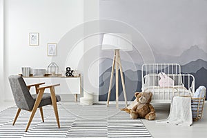 Monochromatic scandinavian child`s bedroom interior