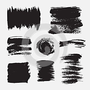 Monochrome abstract vector grunge textures. Set of hand drawn paint brush strokes and stains.