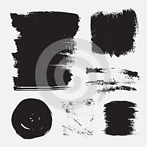 Monochrome abstract vector grunge textures. Set of hand drawn paint brush strokes and stains.