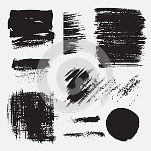 Monochrome abstract vector grunge textures. Set of hand drawn paint brush strokes and stains.