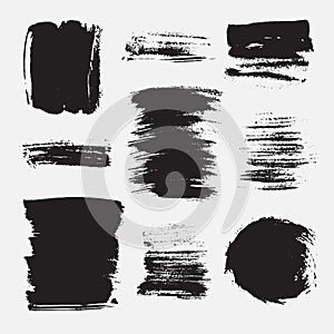 Monochrome abstract vector grunge textures. Set of hand drawn paint brush strokes and stains.