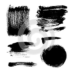 Monochrome abstract vector grunge textures. Set of hand drawn paint brush strokes and stains.