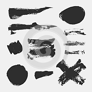 Monochrome abstract vector grunge textures. Set of hand drawn paint brush strokes and stains.