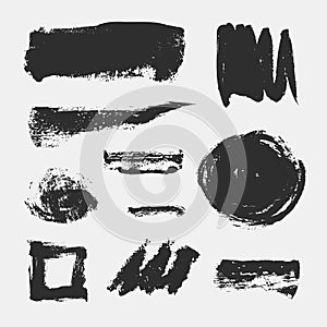 Monochrome abstract vector grunge textures. Set of hand drawn paint brush strokes and stains.