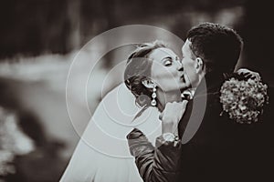 Monochrome black and white photo of the wedding the bride and groom portrait