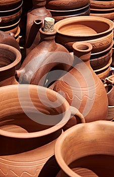 Monochrome ceramic handmade bottles, jugs and pans