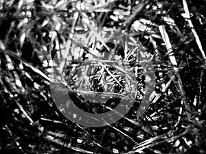 Abstract black and white textured background. Tightly woven chaos of fibers or strands overlapping in an intricate pattern, creati