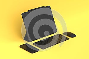 Monochrome computer tablet with keyboard, mouse and phone isolated on yellow