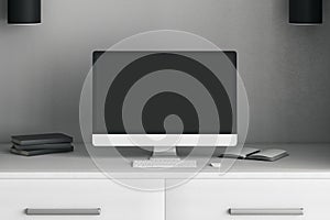 Monochrome concept with modern workspace with personal computer, books and table