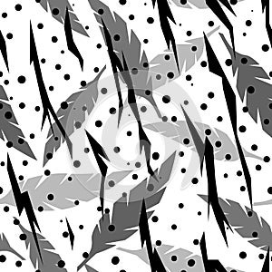 Monochrome feathers and dots abstract pattern