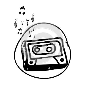 monochrome hand drawing of cassette tape in circle and musical notes