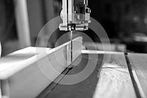 Monochrome image of a bandsaw blade , shallow depth of field