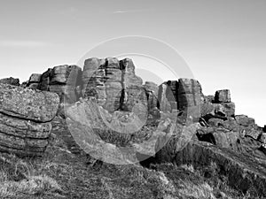 Monochrome image of dramatic gritstone outcrops at bridestones moor in west yorkshire near todmorden