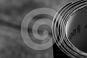 Monochrome image, folded 120 grit sandpaper close up macro shot