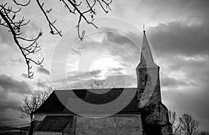 Monochrome image, old catholic church build in the 16 century in Transylvani