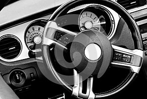 Monochrome photo of the car interior.