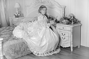 Monochrome photo young aristocrat sitting