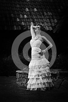 Monochrome portrait of vintage bride in strapless dress