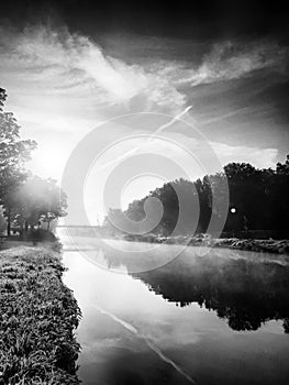 Monochrome scenic river landscape with reflections