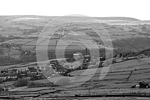 Monochrome scenic view of the village of old town in calderdale west yorkshire with surrounding pennine farms and hills