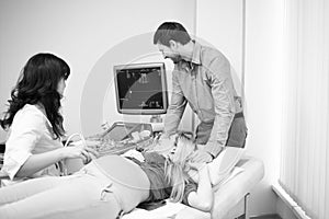 Monochrome shot of a loving pregnant couple at the hospital