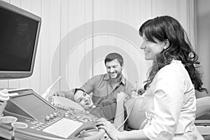 Monochrome shot of a loving pregnant couple at the hospital