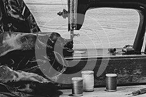 Monochrome still life with antique sewing machine