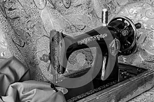 Monochrome still life with antique sewing machine