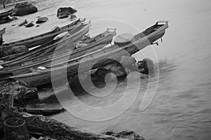 Monochrome tone of boats at the dusk in Toba Lake, North Sumatra, Indonesia.