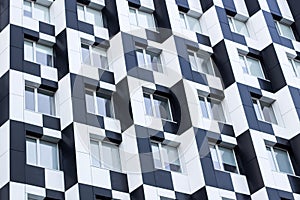 Monochromic cubic minimalistic bauhaus office building facade of