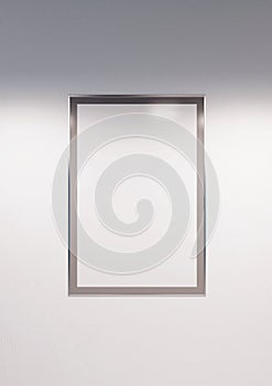 Monochromic frame filled with white paper mockup placard on white wall