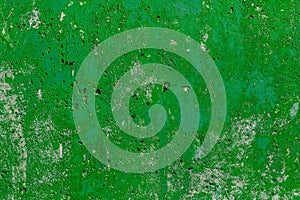 Monocolor green painted flat concrete surface closeup texture