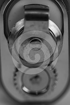 Monocrome macro shot of a tin and can opener