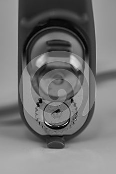 Monocrome macro shot of a tin and can opener